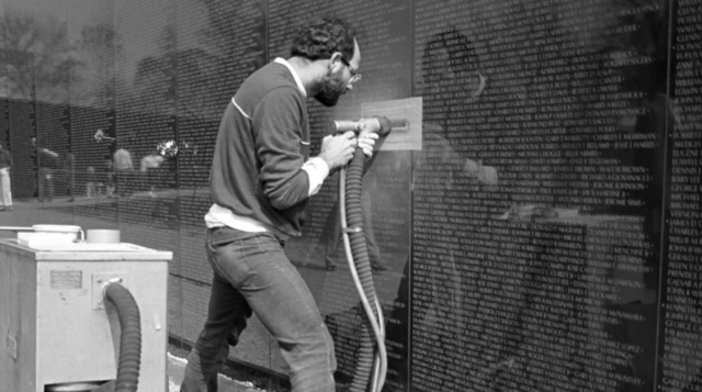 Lucas Century engraving the Vietnam Veterans Memorial. ,vietnam veteran news, mack payne