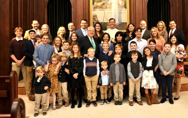 Mike Lambert, center with green necktie, gathers with family members to celebrate his and Peggy’s 50th wedding anniversary at St. Brendan the Navigator Church in Cumming.
LAMBERT FAMILY/PROVIDED
