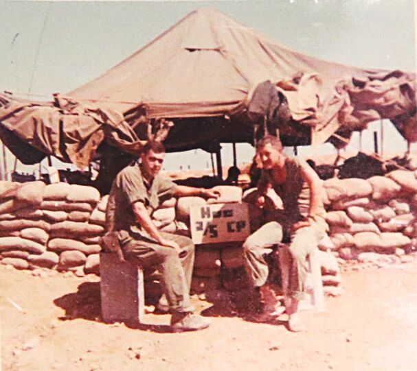 Platoon leader 2nd Lt. Mike Lambert and Staff Sgt. John Miller sit outside their command post at An Hoa Combat Base. Command posts typically were where commanders and their staffs made strategic decisions based on real time information.[LAMBERT FAMILY/PROVIDED]