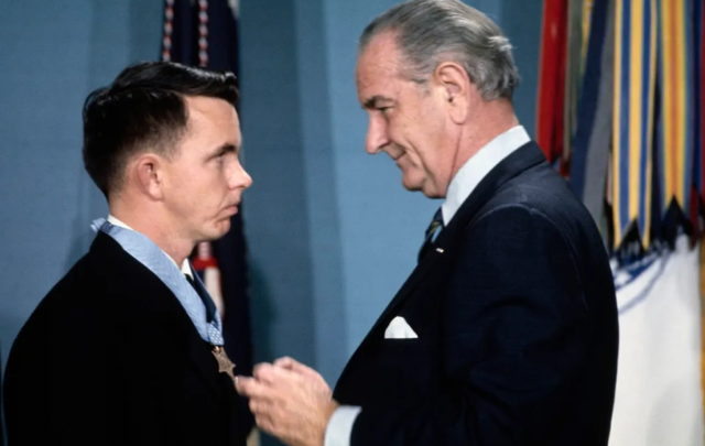 President Lyndon B. Johnson awards Navy Lt. Clyde Lassen the Medal of Honor during a White House ceremony in Washington, January 16, 1969. (UPI/Bettmann Archive/Getty Images)