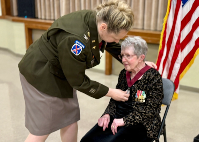 Col. Gwendolyn O’Keefe presents retired Lt. Col. Susan Backs with the O2M3 Medallion during a ceremony on Fort Leavenworth, Kansas, June 4. The Order of Military Medical Merit (O2M3) is a prestigious U.S. Army private organization established in 1982 to recognize individuals who have made significant, sustained contributions to the Army Medical Department.