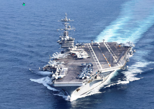 U.S. Navy aircraft carrier USS George Washington is pictured during Freedom Edge trilateral exercise among United States, Japan and South Korea in the East China Sea, south of the Korean peninsula and west of Japan's main islands November 14, 2024. REUTERS/Kim Kyung-Hoon/File Photo Purchase Licensing Rights