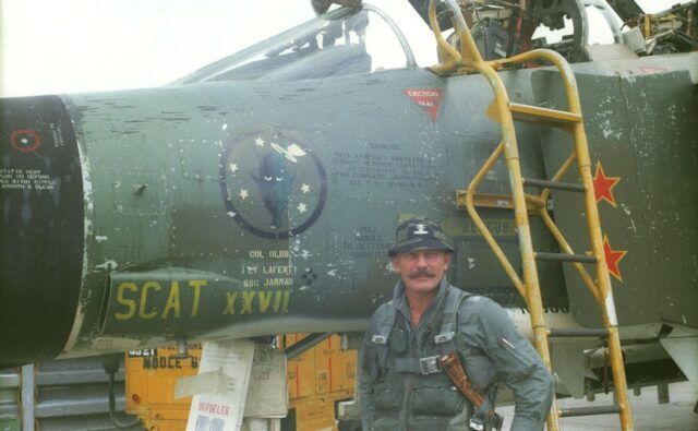 Col. Robin Olds with his F-4C SCAT XXVII. Olds named all his aircraft after his West Point roommate Scat Davis, who could not become a military pilot due to poor eyesight.