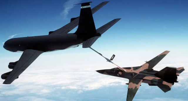 KC-135 towing an F-111